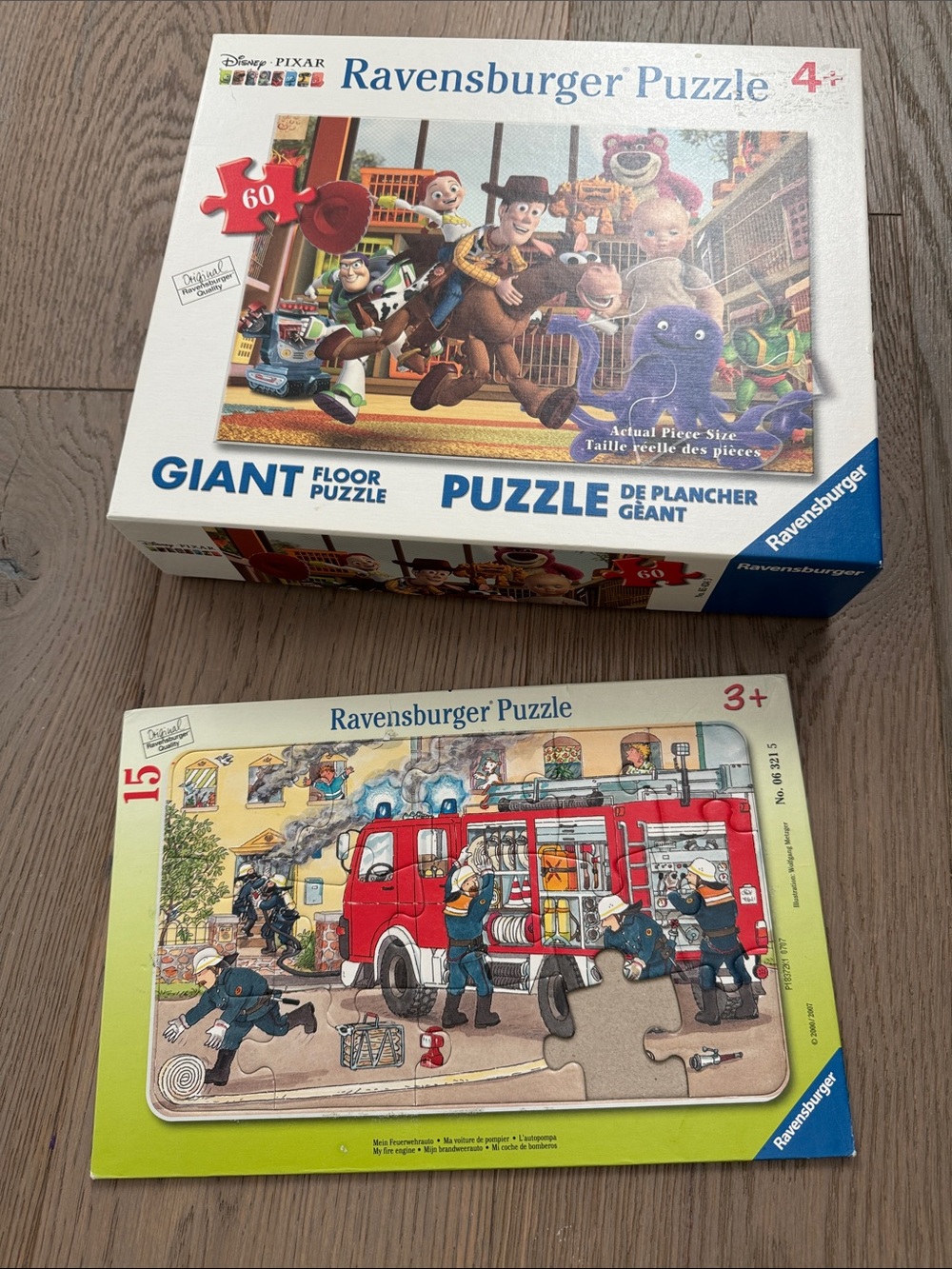 Ravensburger Giant Floor Puzzle - White Box w/ Toy Story & firefighter puzzle
